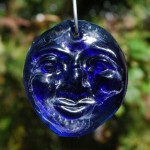 Recycled cobalt blue bottle glass 'Moon' suncatcher.